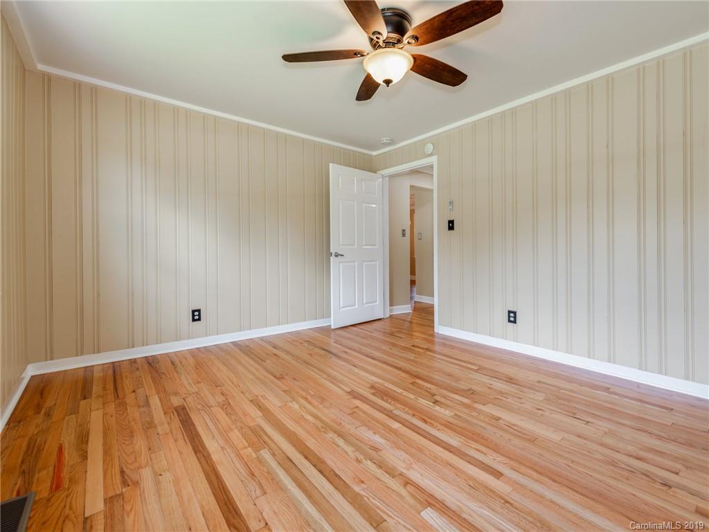 1084 Memorial Park Road Lancaster, SC 29720 - Photo 13 of 24 a view of empty room with wooden floor