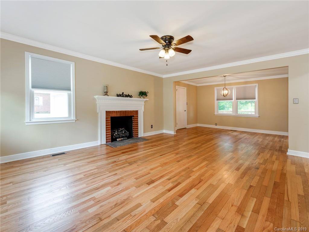 1084 Memorial Park Road Lancaster, SC 29720 - Photo 3 of 24 a view of empty room with wooden floor and fan