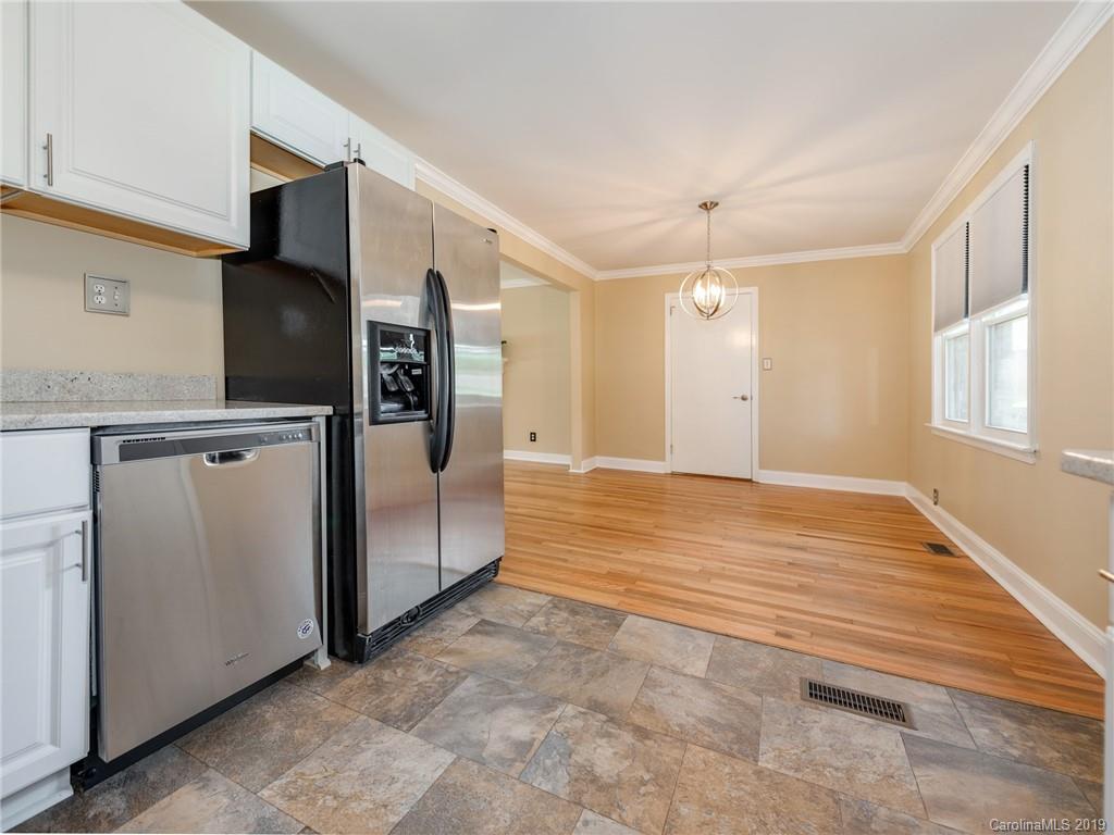 1084 Memorial Park Road Lancaster, SC 29720 - Photo 10 of 24 a view of a kitchen with a sink and refrigerator