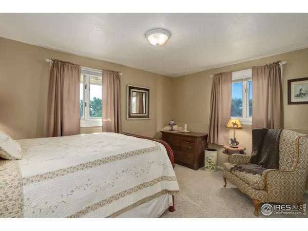 a room with furniture and a flat screen tv