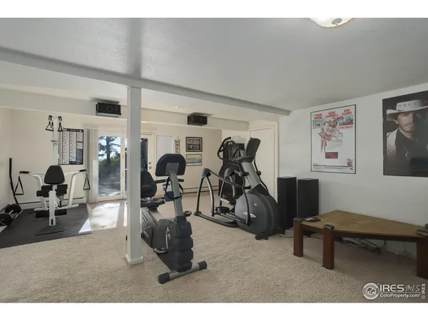 a room with furniture and a dresser