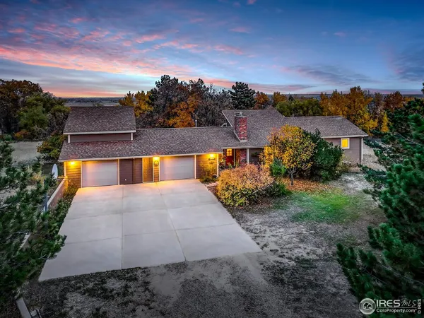 a view of a grassy area with an trees