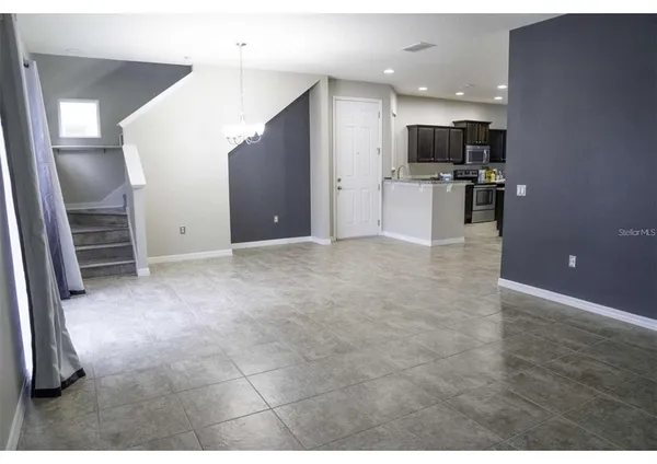 a view of a kitchen with a sink