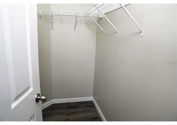 a view of a room with racks on the wall