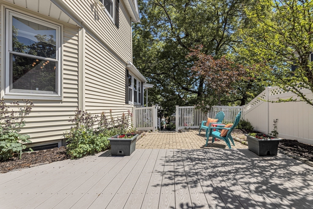 112 Perham Street Boston, MA 02132 - Photo 31 of 36 a backyard of a house with seating space