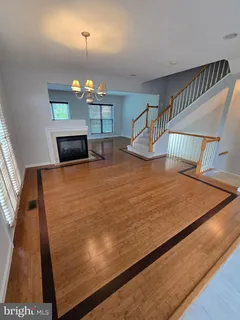 a view of a living room and a chandelier