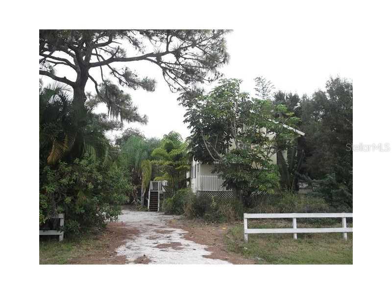 408 Marquette Road Venice, FL 34293 - Photo 1 of 1 a view of outdoor space with street view