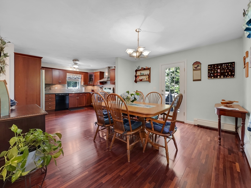 5 Wilson Street Wareham, MA 02571 - Photo 24 of 37 a view of a dining room with furniture wooden floor and chandelier