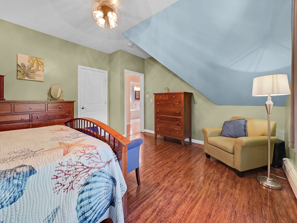 5 Wilson Street Wareham, MA 02571 - Photo 27 of 37 a bedroom with furniture and wooden floor