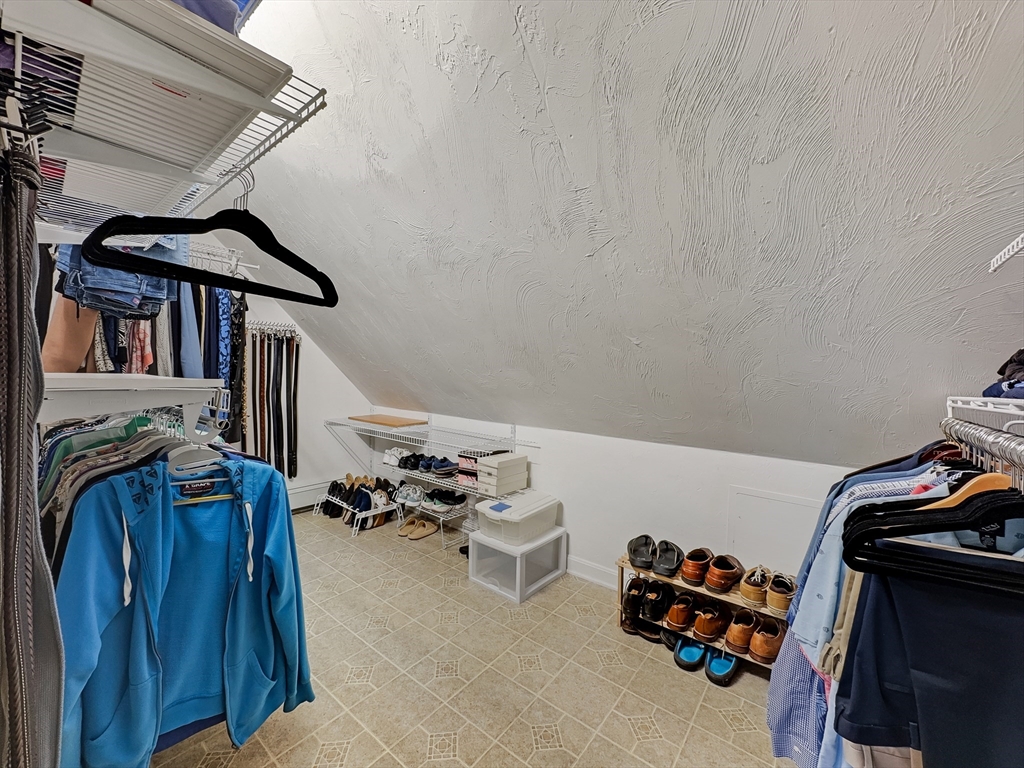 5 Wilson Street Wareham, MA 02571 - Photo 28 of 37 a view of walk in closet with clothes and shoes