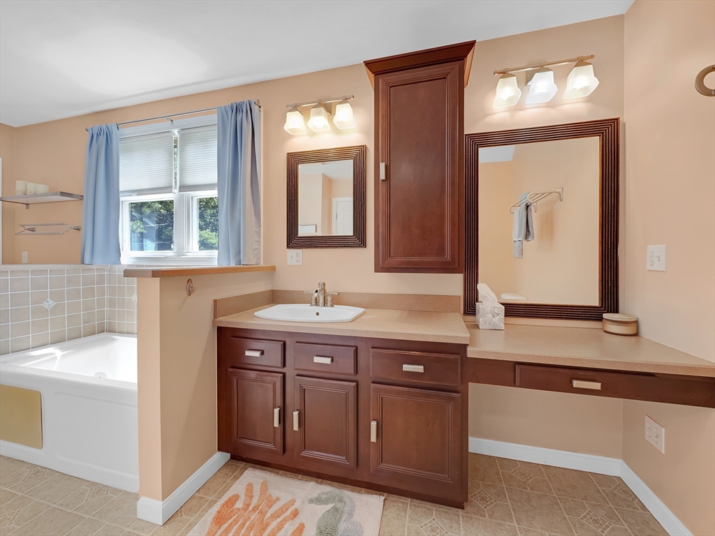 5 Wilson Street Wareham, MA 02571 - Photo 32 of 37 a bathroom with a sink and a mirror