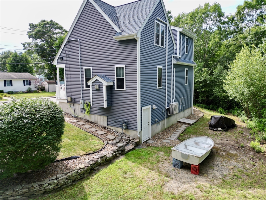 5 Wilson Street Wareham, MA 02571 - Photo 4 of 37 front view of a house with a yard