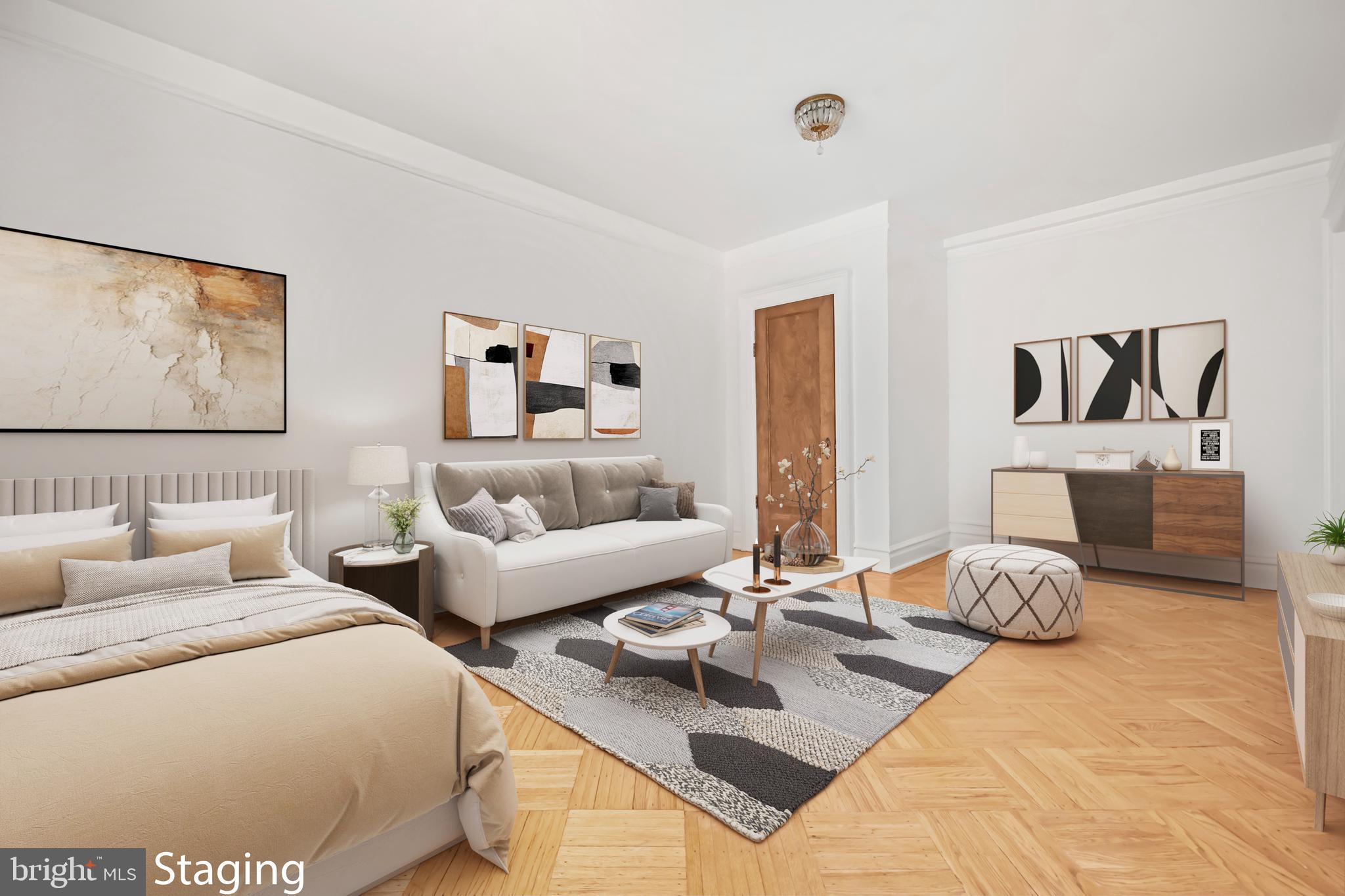2039 New Hampshire Avenue Northwest, Unit 607 Washington, DC 20009 - Photo 3 of 20 a bedroom with two beds and a large mirror