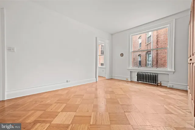 an empty room with windows