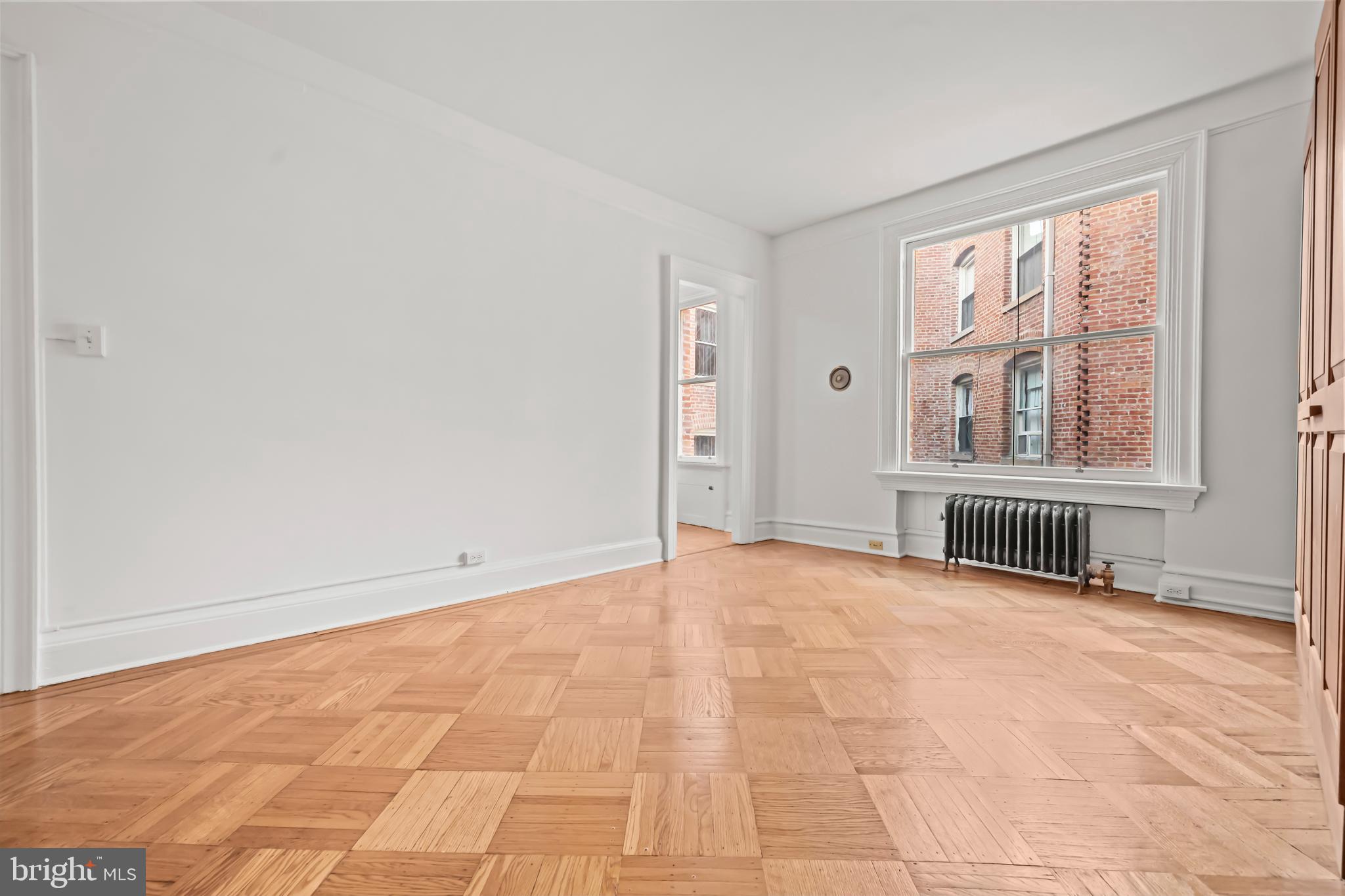 2039 New Hampshire Avenue Northwest, Unit 607 Washington, DC 20009 - Photo 6 of 20 an empty room with windows
