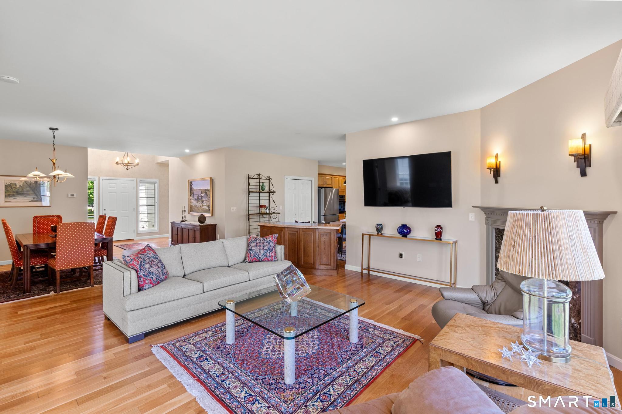 31 Gooseberry Road Suffield, CT 06078 - Photo 8 of 33 a living room with furniture and a flat screen tv