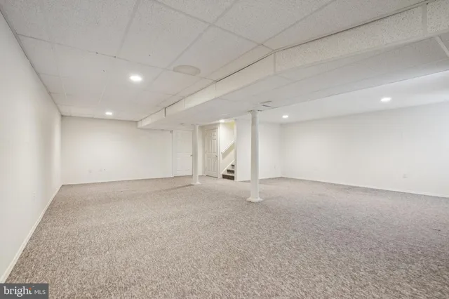 a view of a deck with wooden floor and fence