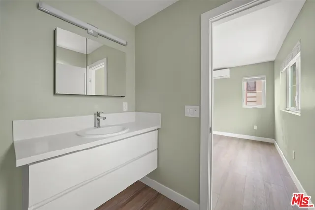 a view of a house with large windows