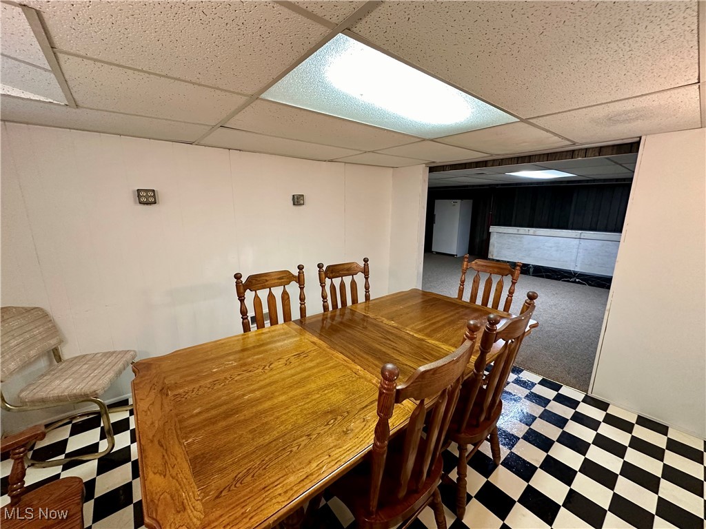 343 Raleigh Avenue Weirton, WV 26062 - Photo 27 of 46 Dining space with a paneled ceiling and carpet