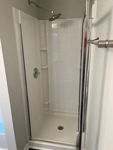 a bathroom with a toilet a sink and bathtub