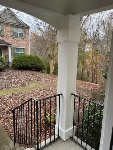 a view of a street from a balcony