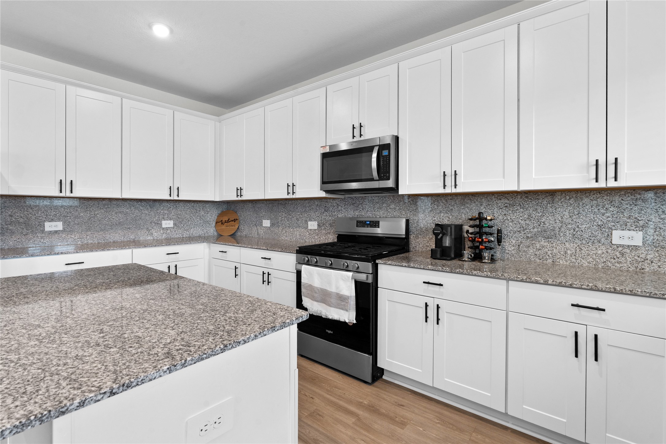 23439 Wrexham Street Spring, TX 77373 - Photo 8 of 25 Granite countertops with full tile backsplash