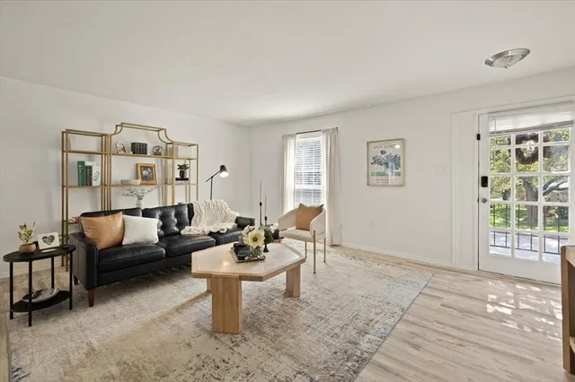 a workspace with furniture and wooden floor