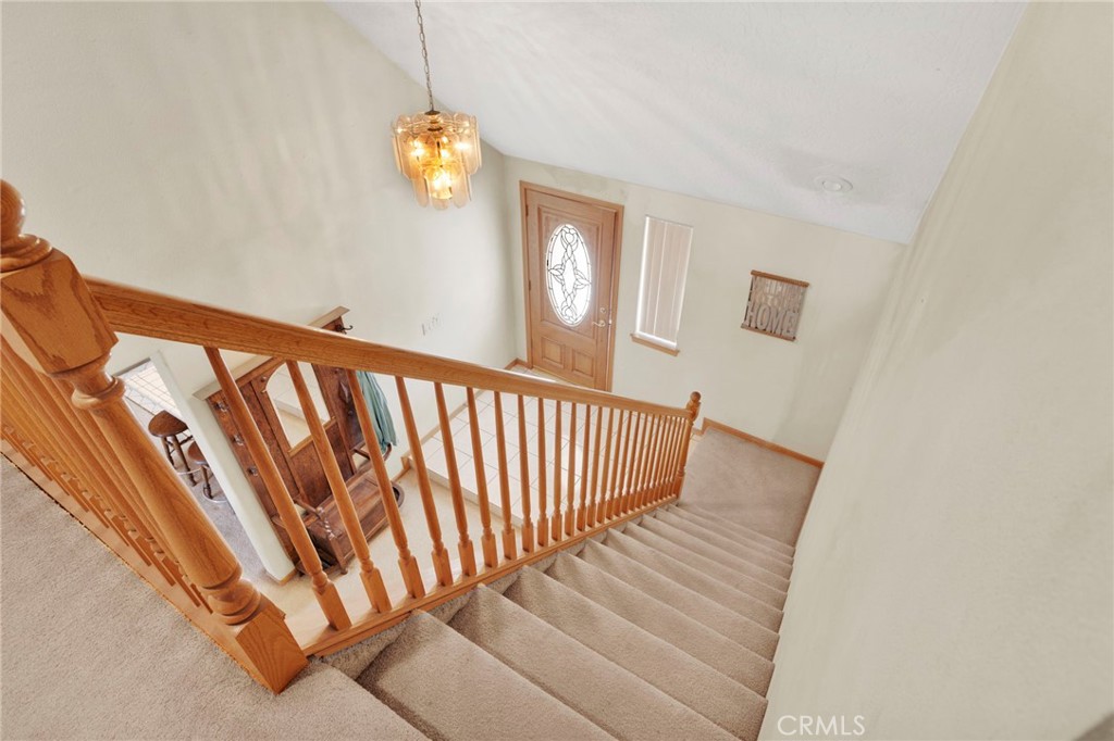 11062 Hollister Road Oak Hills, CA 92344 - Photo 38 of 69 a view of stairs and with windows
