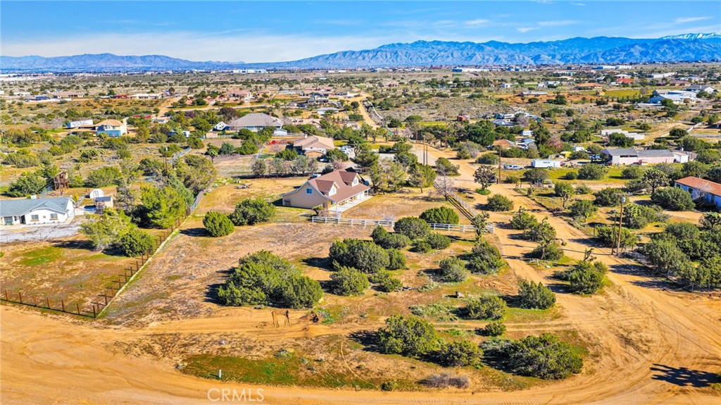 11062 Hollister Road Oak Hills, CA 92344 - Photo 59 of 69 a view of a city with mountains in the background
