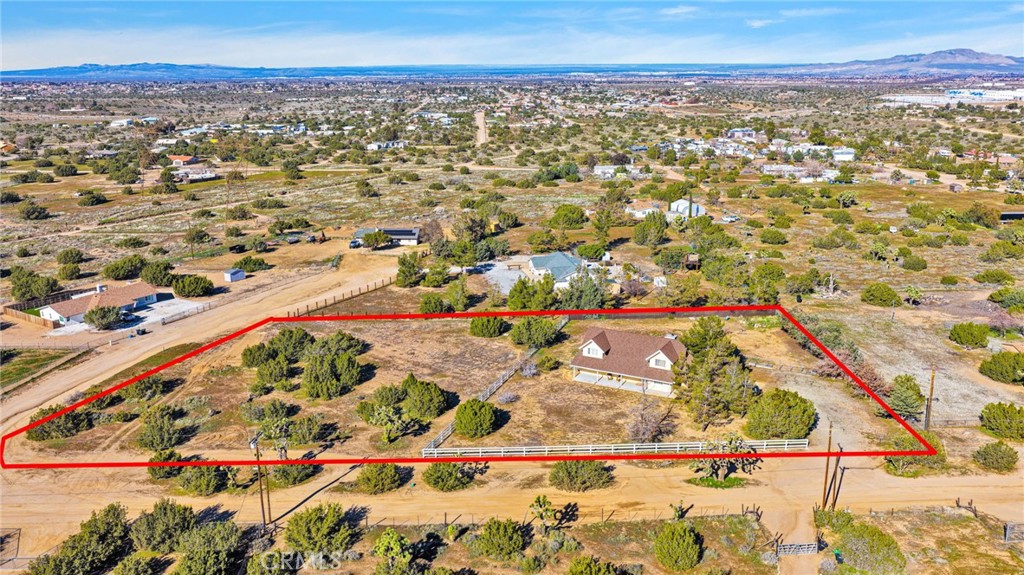 11062 Hollister Road Oak Hills, CA 92344 - Photo 62 of 69 an aerial view of residential houses with outdoor space