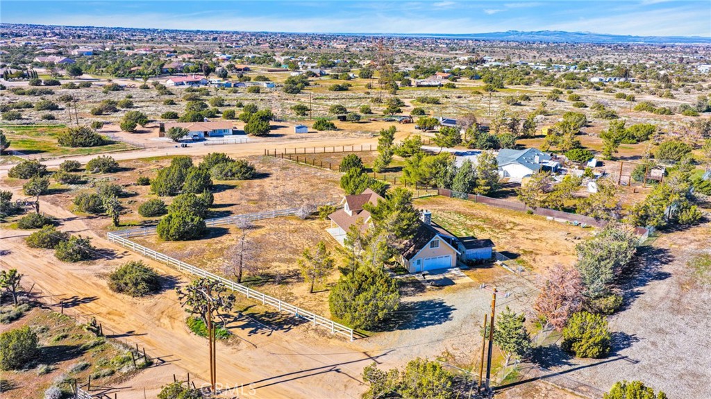 11062 Hollister Road Oak Hills, CA 92344 - Photo 63 of 69 an aerial view of residential houses with outdoor space