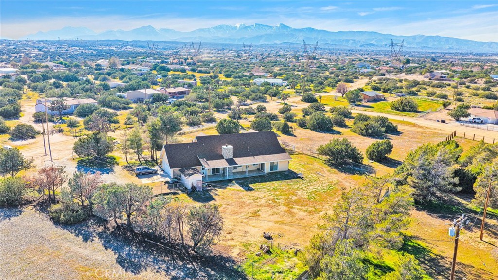 11062 Hollister Road Oak Hills, CA 92344 - Photo 65 of 69 an aerial view of residential houses with outdoor space