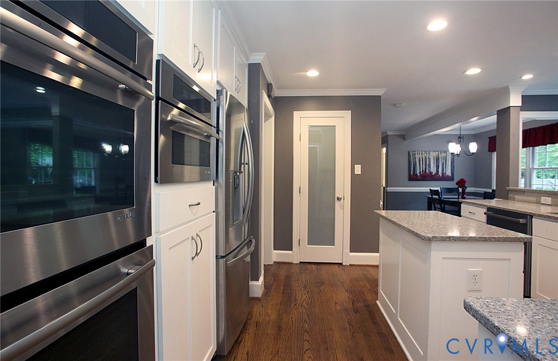 231 Hazelmere Drive Chesterfield, VA 23236 - Photo 8 of 33 a kitchen with stainless steel appliances granite countertop a refrigerator and a sink
