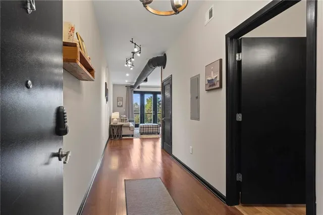 a view of hallway with livingroom