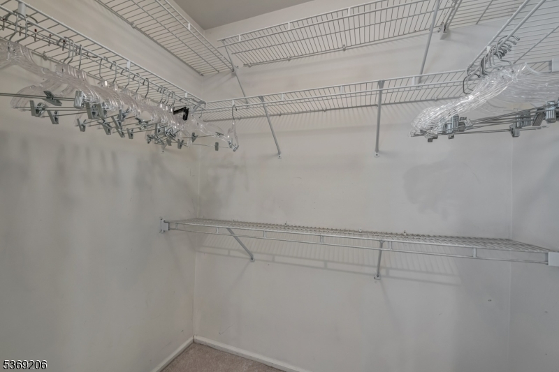 1096 Coventry Way Mahwah, NJ 07430 - Photo 19 of 28 a view of a room with racks on the wall