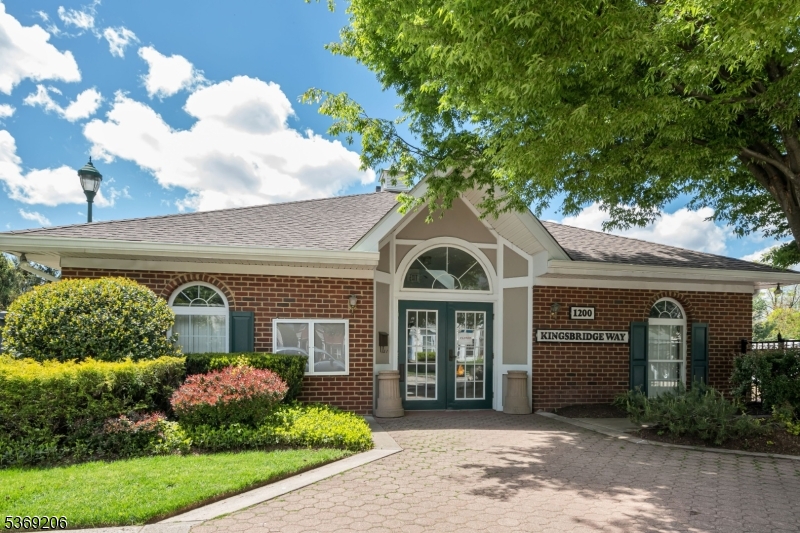 1096 Coventry Way Mahwah, NJ 07430 - Photo 20 of 28 a front view of a house with garden