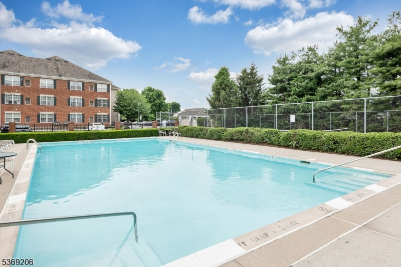 1096 Coventry Way Mahwah, NJ 07430 - Photo 21 of 28 a view of a house with a swimming pool