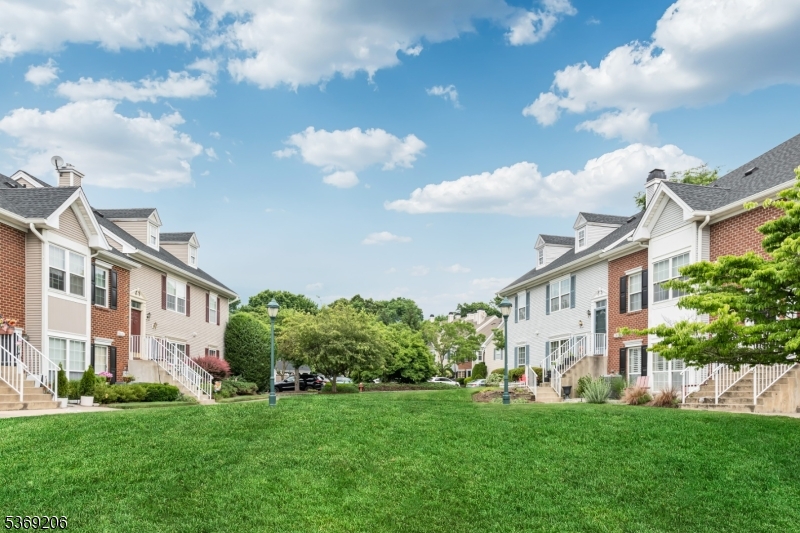 1096 Coventry Way Mahwah, NJ 07430 - Photo 27 of 28 a view of a building with a yard