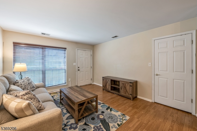 1096 Coventry Way Mahwah, NJ 07430 - Photo 7 of 28 a living room with furniture and a window