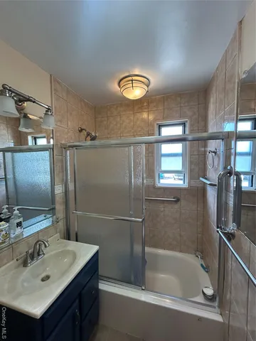 a bathroom with a toilet and a sink