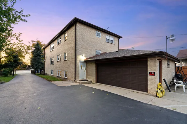 a view of a house with a street