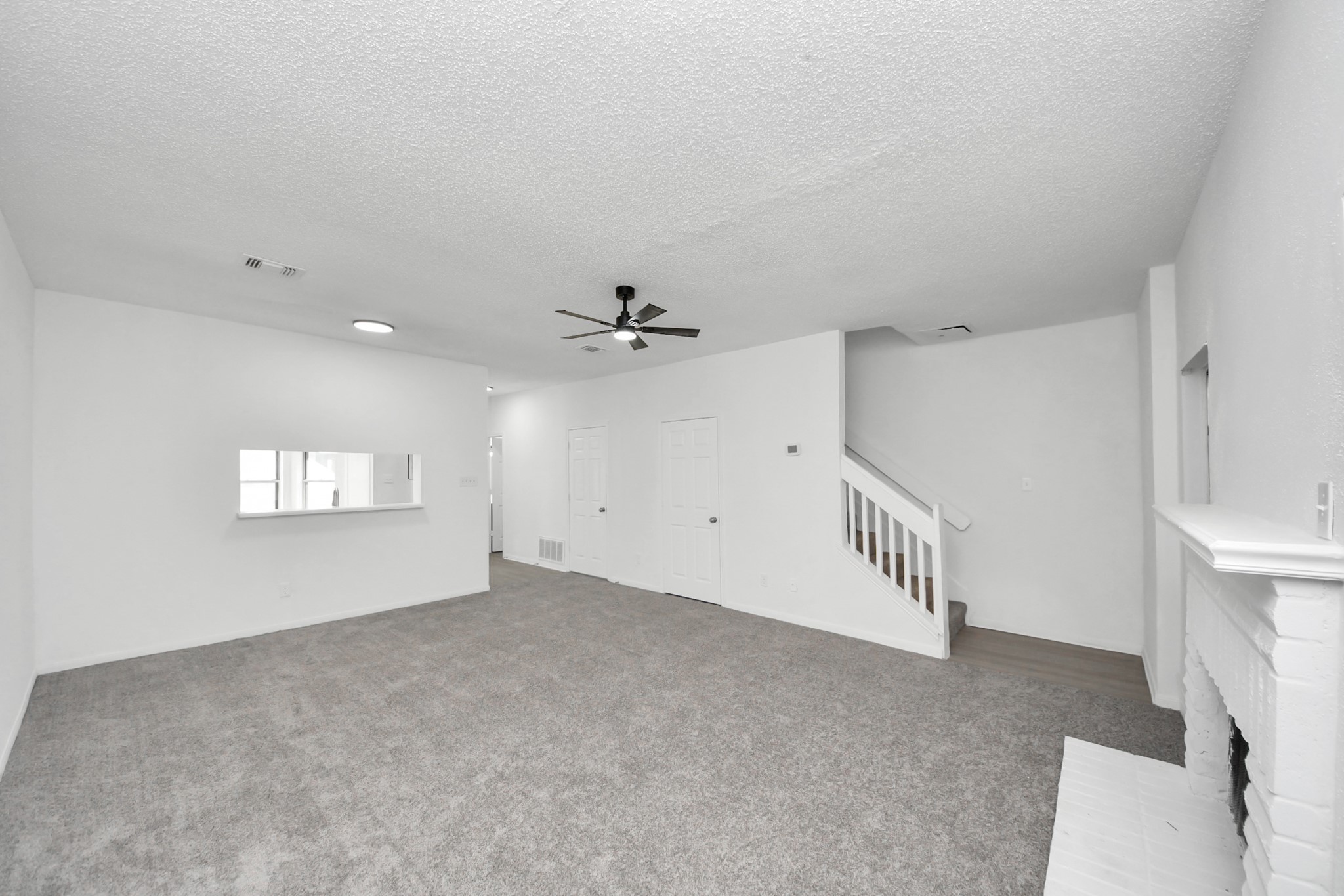 12500 Brookglade Circle, Unit 176 Houston, TX 77099 - Photo 11 of 25 a view of an empty room with a window