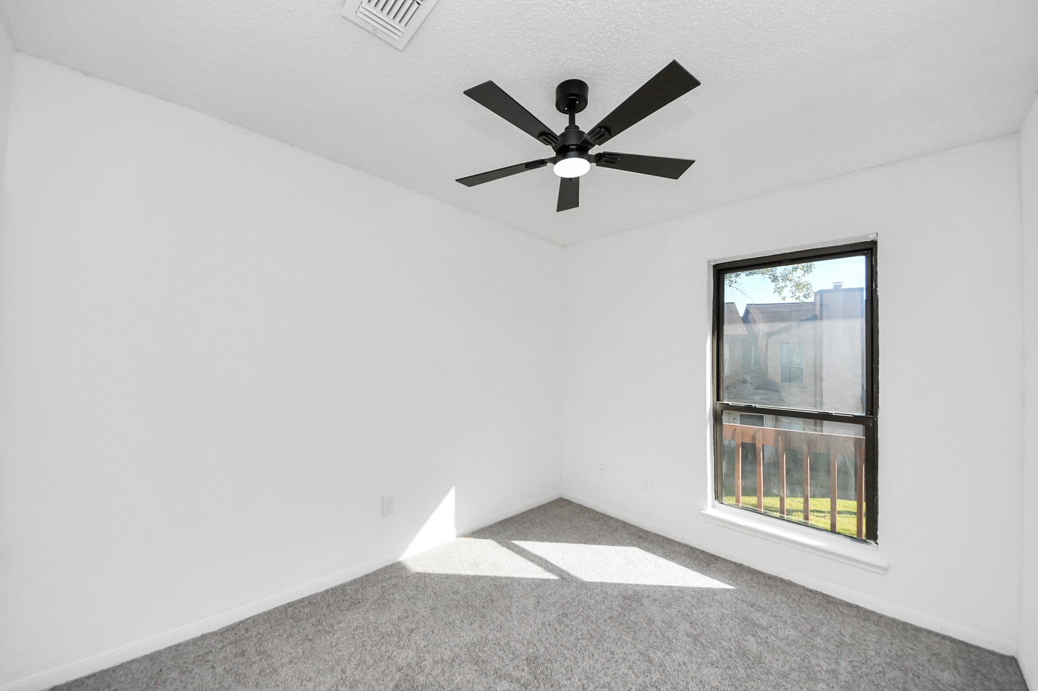 12500 Brookglade Circle, Unit 176 Houston, TX 77099 - Photo 15 of 25 a view of a big room with wooden floor and windows