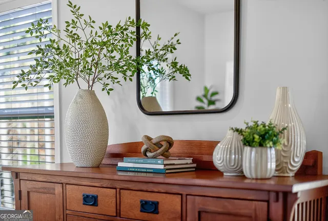 a vase of flowers sitting on a table