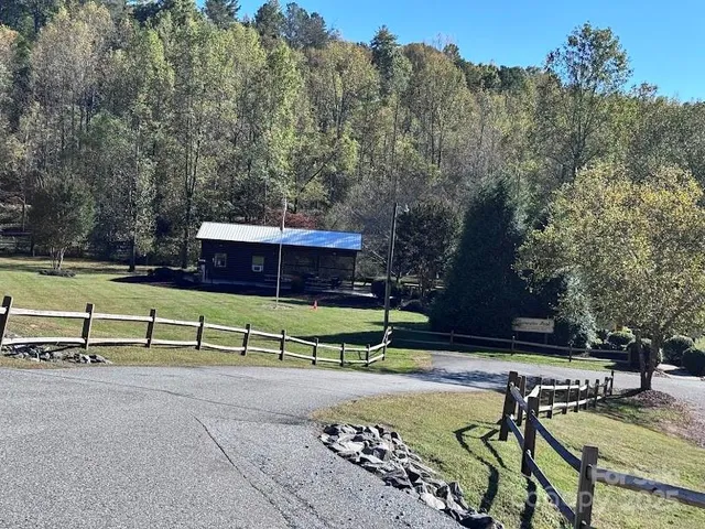 a view of a city with lush green forest
