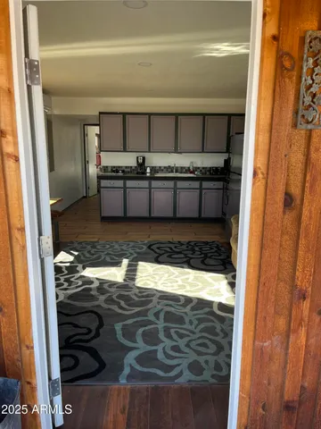 a kitchen with stainless steel appliances granite countertop a stove and a refrigerator