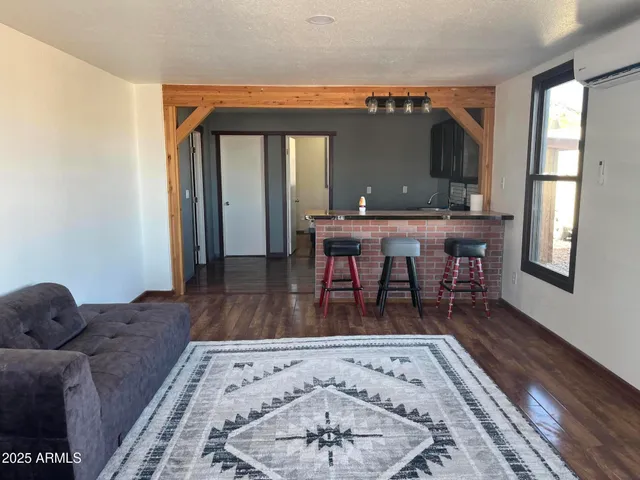a living room with a couch and a table