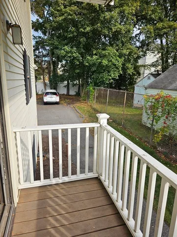 a view of a wooden fence