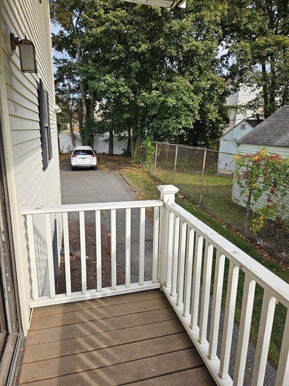 15 Houghton Street, Unit 7A Worcester, MA 01604 - Photo 3 of 7 a view of a wooden fence