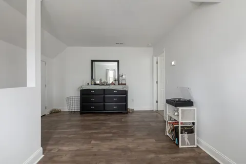 a stove top oven sitting inside of a kitchen